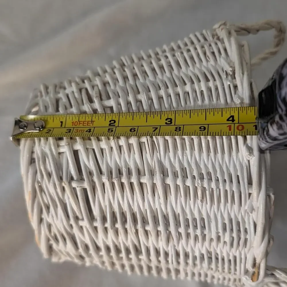 White wicker basket with handles